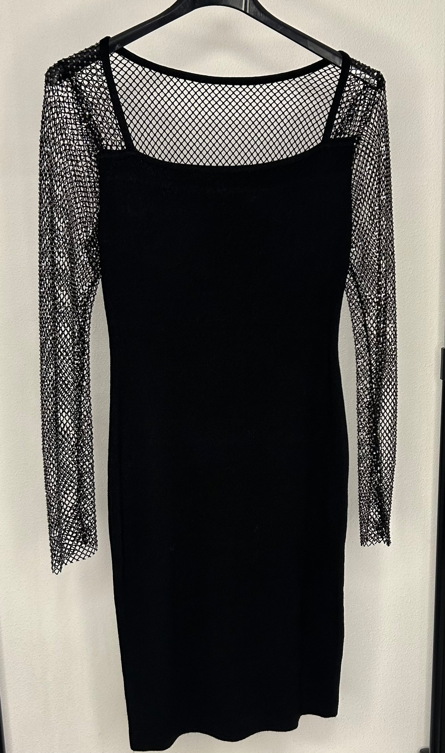 Jurk met doorzichtige glitter mouw