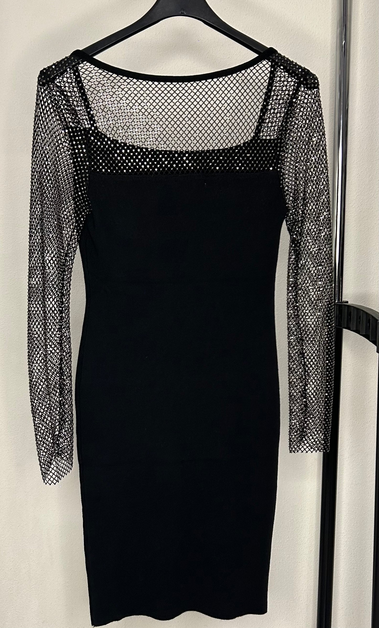 Jurk met doorzichtige glitter mouw